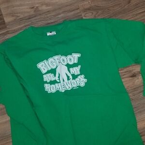 Gildan Youth XL Long Sleeve Shirt. Bigfoot theme long sleeve tshirt. Green. XL.